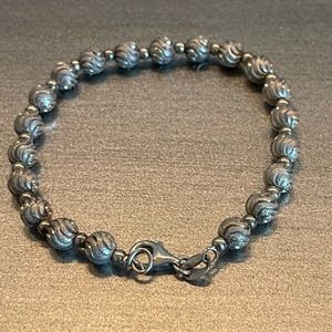 Macys sterling silver bracelet with small diamonds.